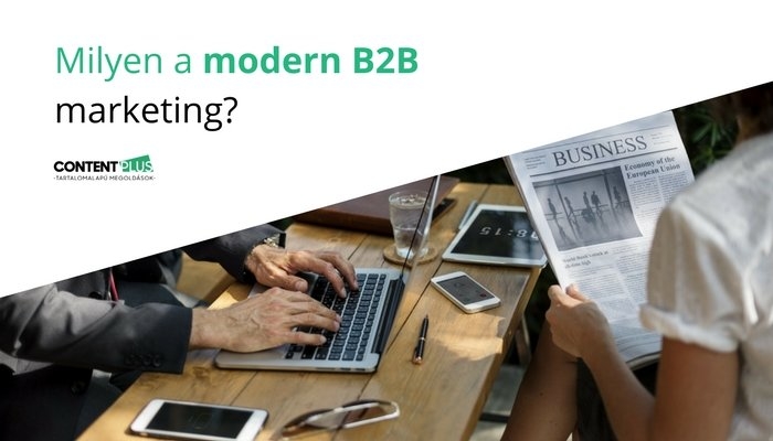 Milyen a modern B2B Férfi laptopon dolgozik, nő újságot olvas